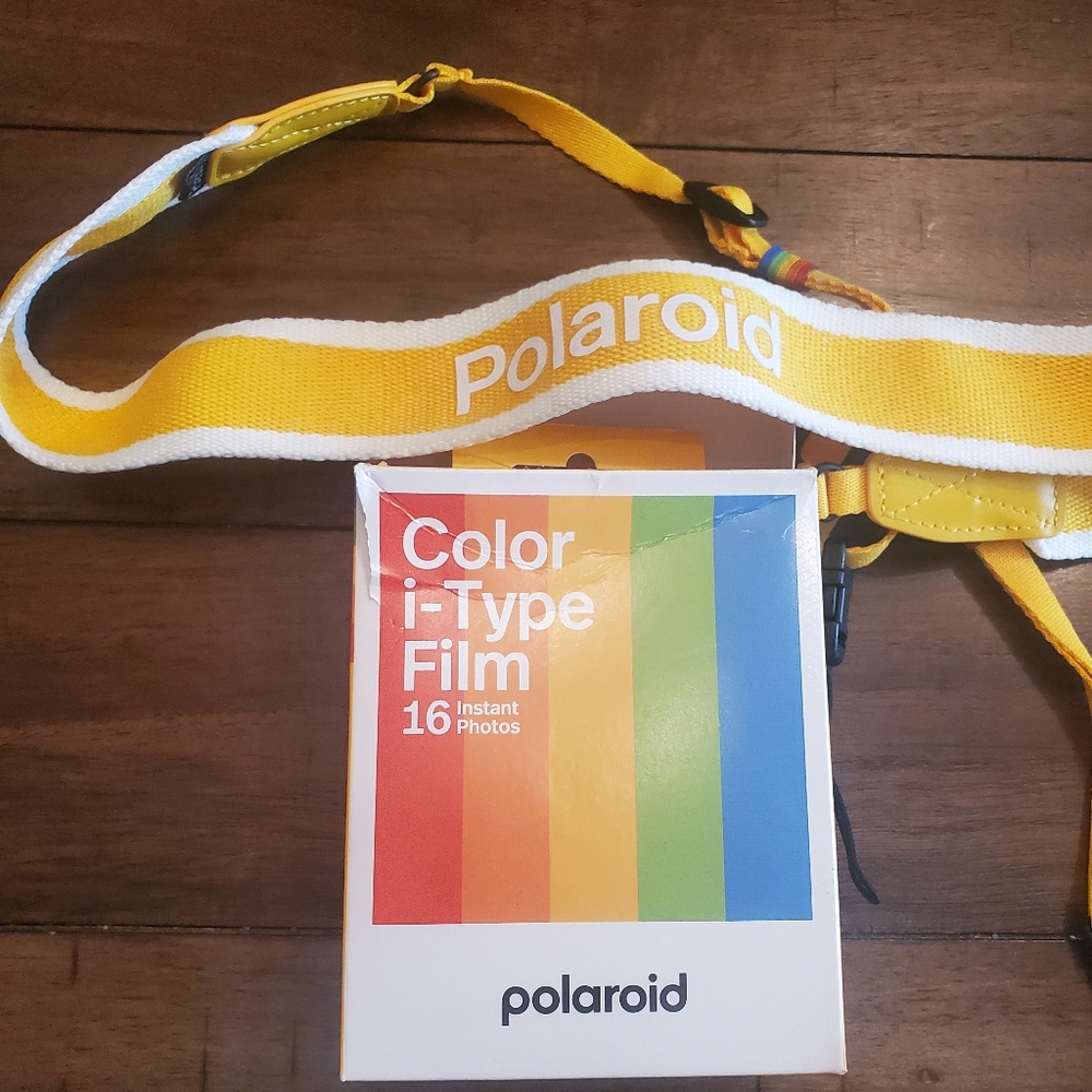 Polaroid film and camera strap